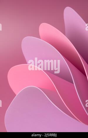 Purple and pink curved sheets abstract wallpaper. Business pastel background. Stock Photo