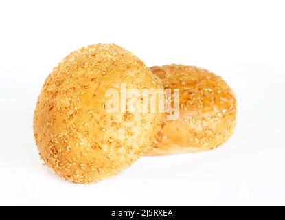 Two delicious buns sprinkled with sesame seeds. Burger bun isolated on white background Stock Photo