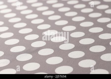 Seamless polka dots gray pattern closeup. Polka dot fabric Stock Photo