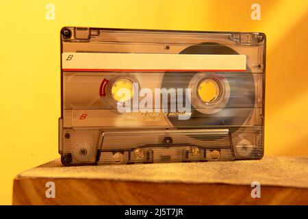 close-up shot of old transparent cassette tape with label on side b Stock Photo