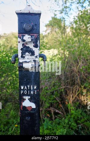 An old water topping up point for canal boats on the Shropshire Union canal near Audlem in Cheshire, England, UK Stock Photo