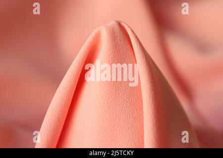 Pale pink fabric in the form of cone Stock Photo