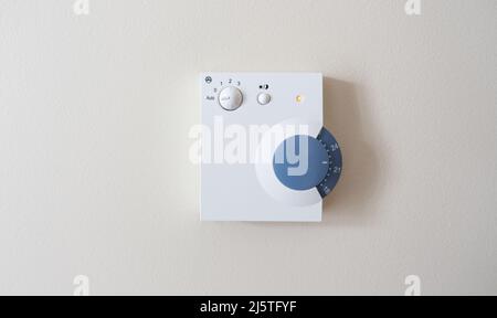 old-fashioned climate control panel on the wall Stock Photo
