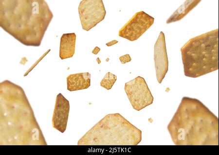 Collection of Crackers falling isolated on white background. Selective focus Stock Photo