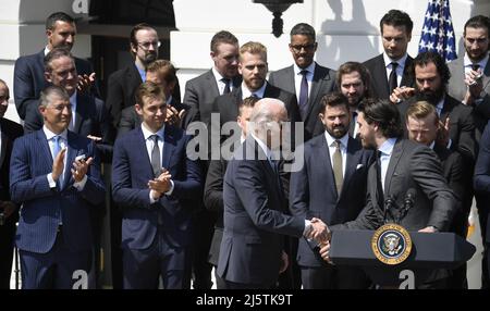 Washington, United States. 25th Apr, 2022. President Joe Biden (L) shakes hands with National Hockey League Tampa Bay Lightning defenseman Ryan McDonagh as the winners of the 2020 and 2021 Stanley Cup championship are welcomed to the White House, in Washington, Monday, April 25, 2022. Photo by Mike Theiler/UPI Credit: UPI/Alamy Live News Stock Photo