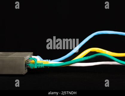 Ethernet Network Cables plugged into internet router Stock Photo