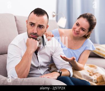 Sad male is depressing and husband is supporting him Stock Photo