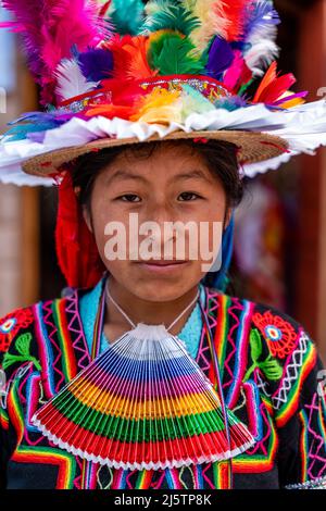 A Young Taquileno Woman In Traditional Costume, Taquile Island, Lake Titicaca, Puno, Peru. Stock Photo