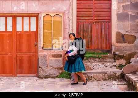 A Young Taquileno Woman In Traditional Costume, Taquile Island, Lake Titicaca, Puno, Peru. Stock Photo