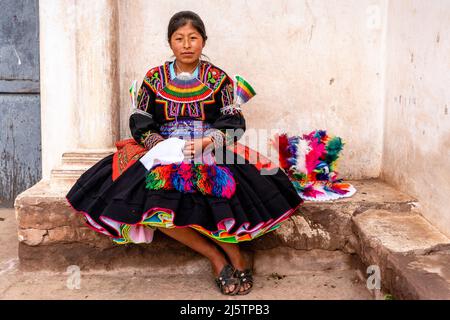 A Young Taquileno Woman In Traditional Costume, Taquile Island, Lake Titicaca, Puno, Peru. Stock Photo