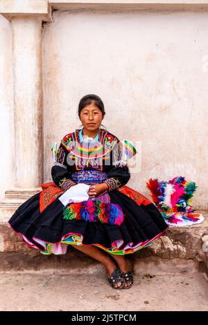 A Young Taquileno Woman In Traditional Costume, Taquile Island, Lake Titicaca, Puno, Peru. Stock Photo