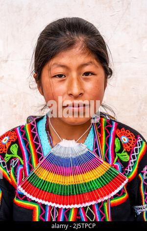 A Young Taquileno Woman In Traditional Costume, Taquile Island, Lake Titicaca, Puno, Peru. Stock Photo