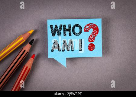 Who Am I. Blue speech bubble on a gray background. Stock Photo