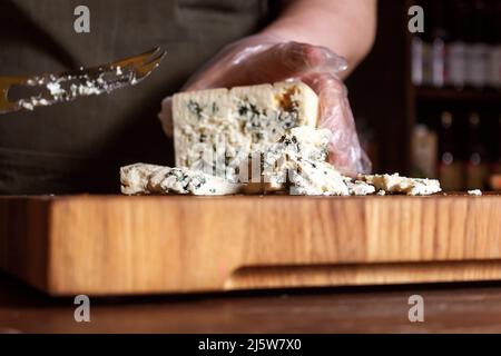 Cheese shop. Roquefort. Selective focus. Close up. Stock Photo