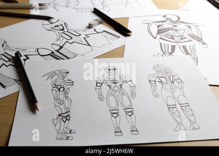 Sketches on paper of animated drawings of cyborg robots as characters for a video game. Concept art. Stock Photo