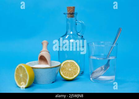 Lemons, washing soda, bottle of vinegar and glass Stock Photo by  ©Syda_Productions 375407254