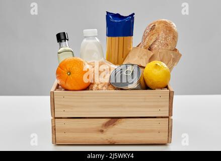food in wooden box on table Stock Photo