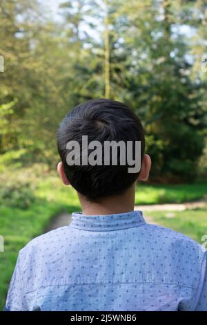 Rear view of 10 years old boy Stock Photo