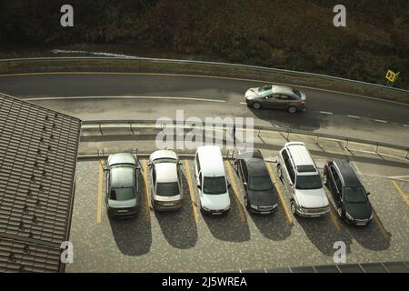 Odessa, Ukraine - 20 january 2022: Hotel parking with cars in ski resort Stock Photo