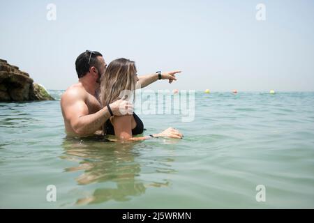 Man and woman in the water Stock Photo