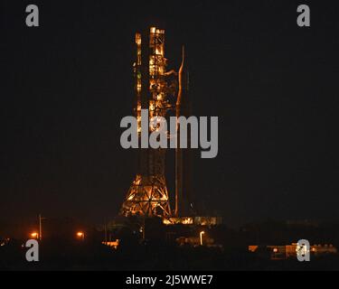 NASA's SLS Booster rolls back to the Vehicle Assembly Building at the Kennedy Space Center, Florida on Tuesday, April 26, 2022. NASA plans to conduct repairs to the rocket and its mobile launch platform before returning to the pad for a wet dress rehearsal and tanking test. Photo by Joe Marino/UPI Credit: UPI/Alamy Live News Stock Photo