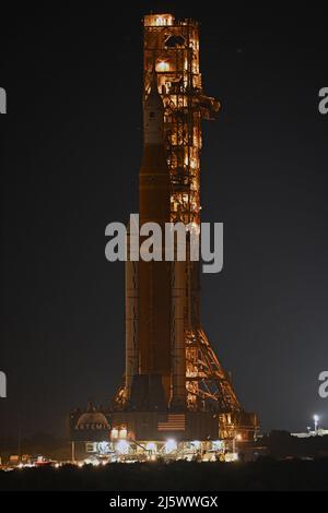 NASA's SLS Booster rolls back to the Vehicle Assembly Building at the Kennedy Space Center, Florida on Tuesday, April 26, 2022. NASA plans to conduct repairs to the rocket and its mobile launch platform before returning to the pad for a wet dress rehearsal and tanking test. Photo by Joe Marino/UPI Credit: UPI/Alamy Live News Stock Photo