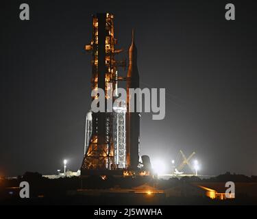 NASA's SLS Booster rolls back to the Vehicle Assembly Building at the Kennedy Space Center, Florida on Tuesday, April 26, 2022. NASA plans to conduct repairs to the rocket and its mobile launch platform before returning to the pad for a wet dress rehearsal and tanking test. Photo by Joe Marino/UPI Credit: UPI/Alamy Live News Stock Photo