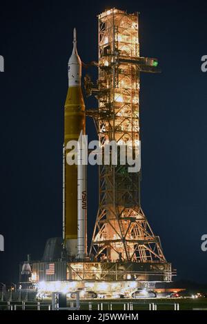 NASA's SLS Booster rolls back to the Vehicle Assembly Building at the Kennedy Space Center, Florida on Tuesday, April 26, 2022. NASA plans to conduct repairs to the rocket and its mobile launch platform before returning to the pad for a wet dress rehearsal and tanking test. Photo by Joe Marino/UPI Credit: UPI/Alamy Live News Stock Photo