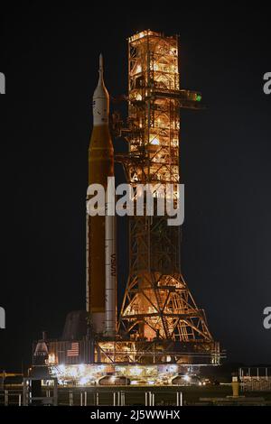 NASA's SLS Booster rolls back to the Vehicle Assembly Building at the Kennedy Space Center, Florida on Tuesday, April 26, 2022. NASA plans to conduct repairs to the rocket and its mobile launch platform before returning to the pad for a wet dress rehearsal and tanking test.     Photo by Joe Marino/UPI Stock Photo