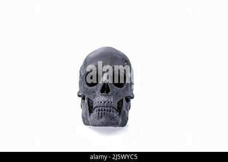 skull black isolated on white background with shadow Stock Photo