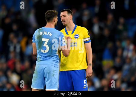 Manchester City's Ruben Dias exchanges words with Brighton and Hove Albion's Lewis Dunk. Picture date: Thursday April 21, 2022. Photo credit should read:   Anthony Devlin/Alamy Live News/Alamy Live News Stock Photo