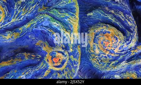 Abstract cement background is painted with bright blue colors with orange splashes. Abstract streaks of blue paint Stock Photo