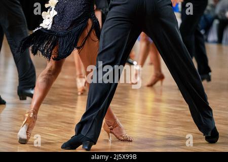 legs male and female dancers in dance competition Stock Photo