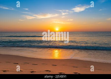 Stunning sunrise and beach landscape. Stock Photo