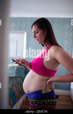Pregnant Woman Sports Bras Show Her Stock Photo 774182428