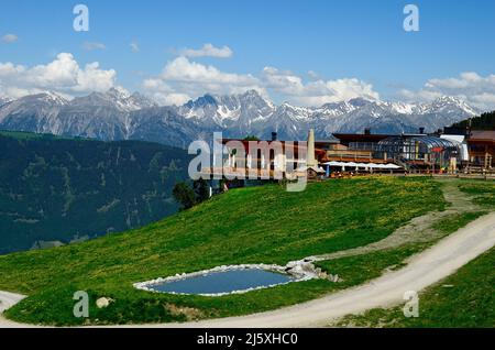 Jerzens, Austria - June 24th 2016: Hochzeiger- Haus, cfe-restaurant and summit station for cable car with view to Tyrolen alps Stock Photo