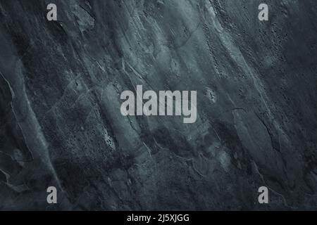 Dark worn surface background with grunge rough peeled texture Stock Photo