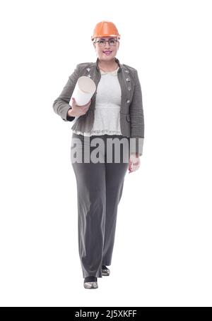 female architect with a roll of drawings stepping forward Stock Photo