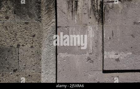 Horizontal view old brown and gray concrete block wall background texture Stock Photo