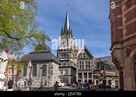 Aachen Cathedral and tourists on a bright spring day Stock Photo