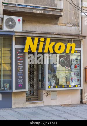 Belgrade, Serbia - March 13, 2022: Photographer Equipment Camera Shop Nikon Yellow Store in Capital City Centre. Stock Photo