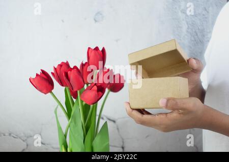 person open a empty small gift box  Stock Photo