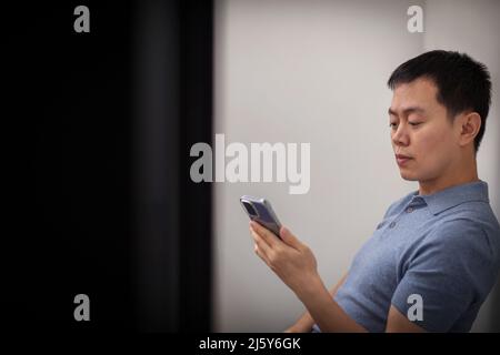 Businessman using smart phone Stock Photo