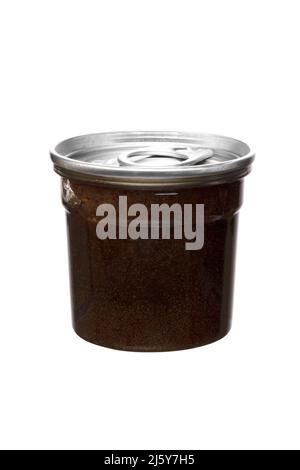 brown coffee scrub in transparent jar with metal lid on white insulated background Stock Photo