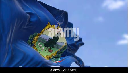The US state flag of Vermont waving in the wind. Vermont is a state in the New England region of the United States. Democracy and independence. Stock Photo