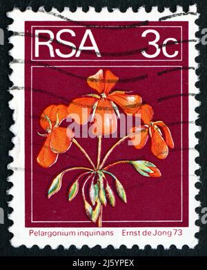 SOUTH AFRICA - CIRCA 1974: a stamp printed in South Africa shows Geranium, Pelargonium Inquinans, Flowering Plant, circa 1974 Stock Photo