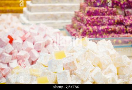Various pieces of oriental sweets close up. Colorful arabic delights. Stock Photo
