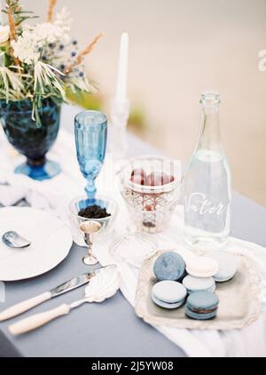 Wedding dinner at the beach. Catering table setting Stock Photo