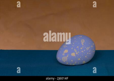 Egg on a bicolor background. Easter egg. Stock Photo