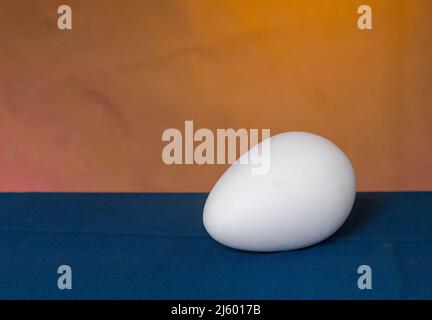 Egg on a bicolor background. Easter egg. Stock Photo